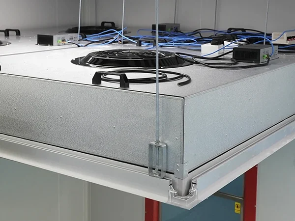 Many fan filter units are suspended on the ceiling.