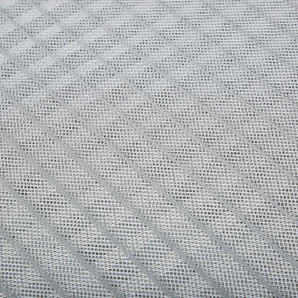 A single piece of coarse air filter material made of metal mesh