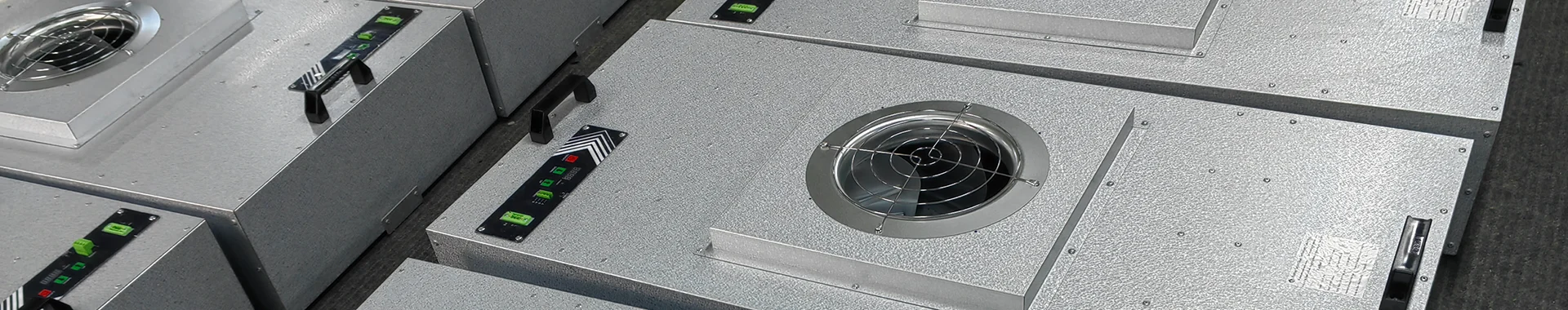 Many fan filter units are placed on the ground.