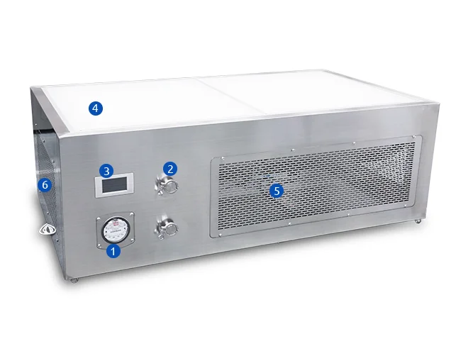 A stainless steel laminar flow hood with many accessories